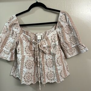 Pink and white women’s cropped top